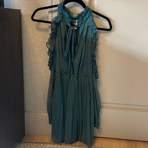 Free People mini dress with tie neck and sheer sleeves